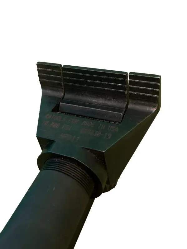 A close up of the handle on a black hose